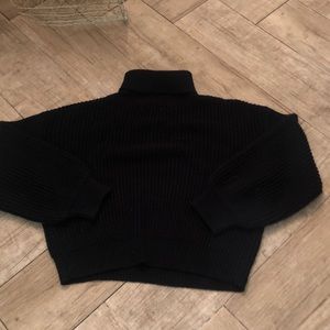 Black turtle neck sweater